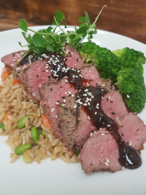 Hoisin Top Sirloin Steak served with Rose’s “Fried” Rice and Stir Fried Edamame