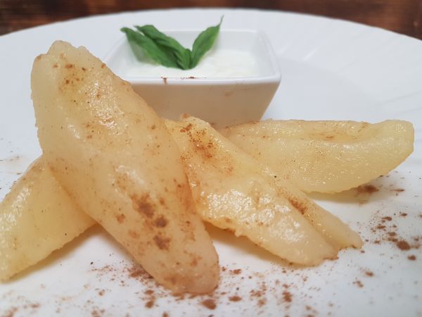 Poached Pear served with Vanilla Yogurt