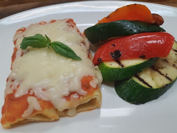 Spinach Cannelloni served with Tomato Sauce, with Steamed Rappini and Julienned Vegetables