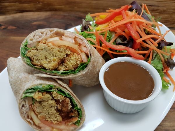 Vegan Falafel Wrap with Hummus, Spinach, Tomatoes, served with Mixed Green Salad and Balsamic Vinaigrette