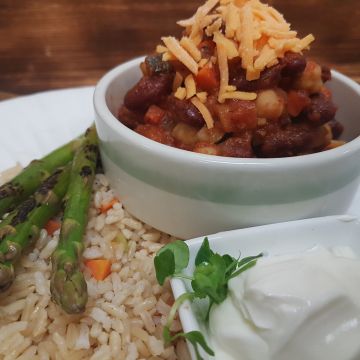 Vegetable and Bean Chilli with Grated Cheese