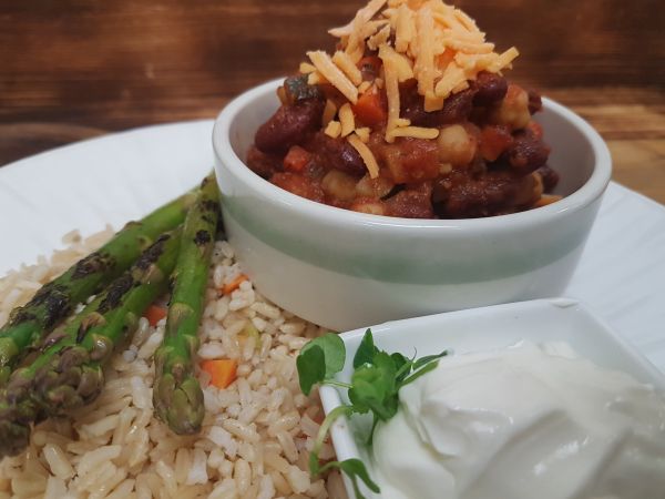 Vegetable and Bean Chilli with Grated Cheese